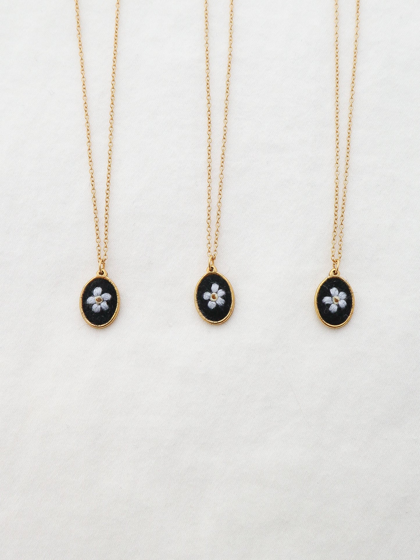 The Dainty Forget Me Not Necklace in Noir