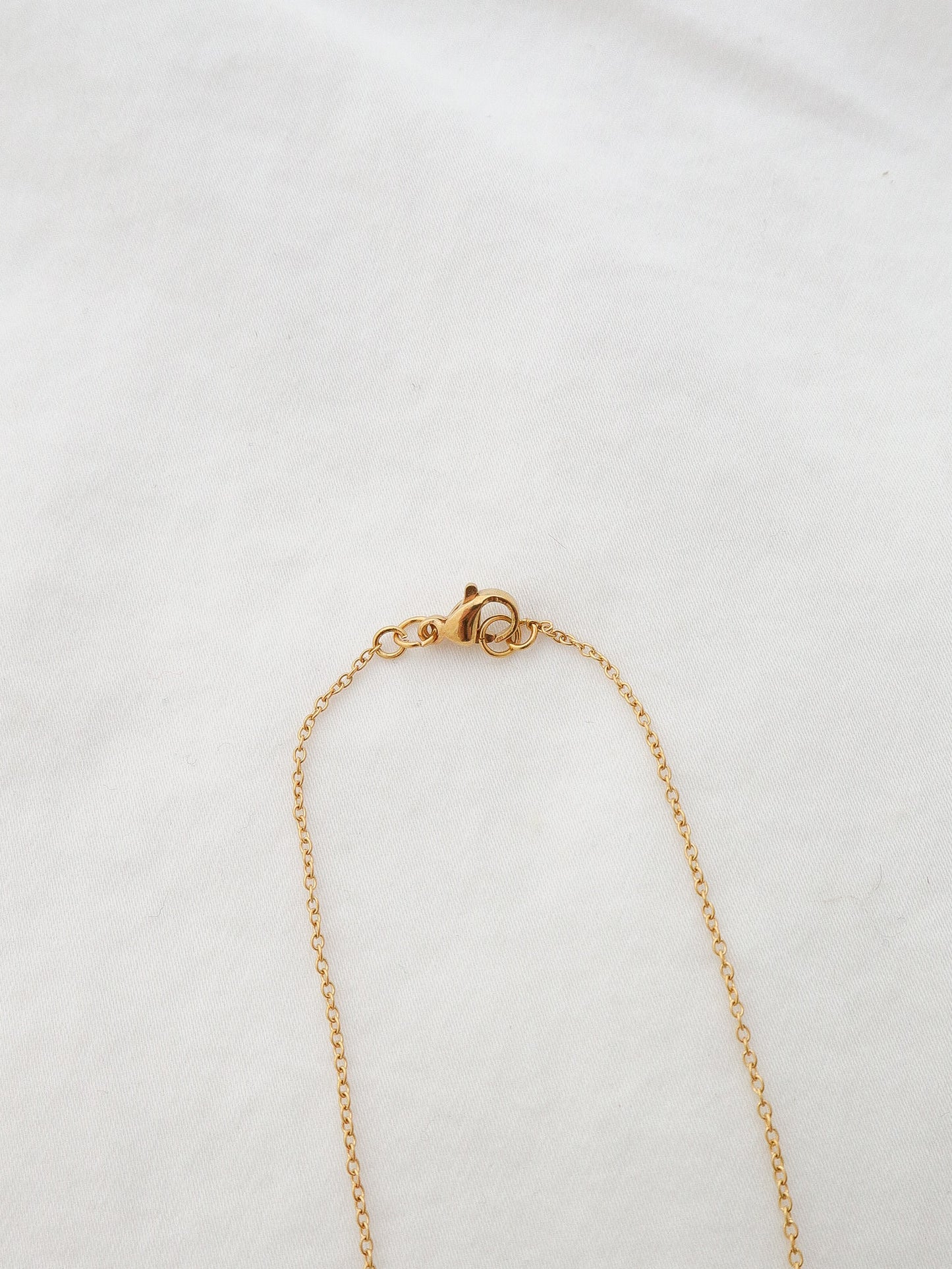 The Dainty Forget Me Not Necklace in Ivory