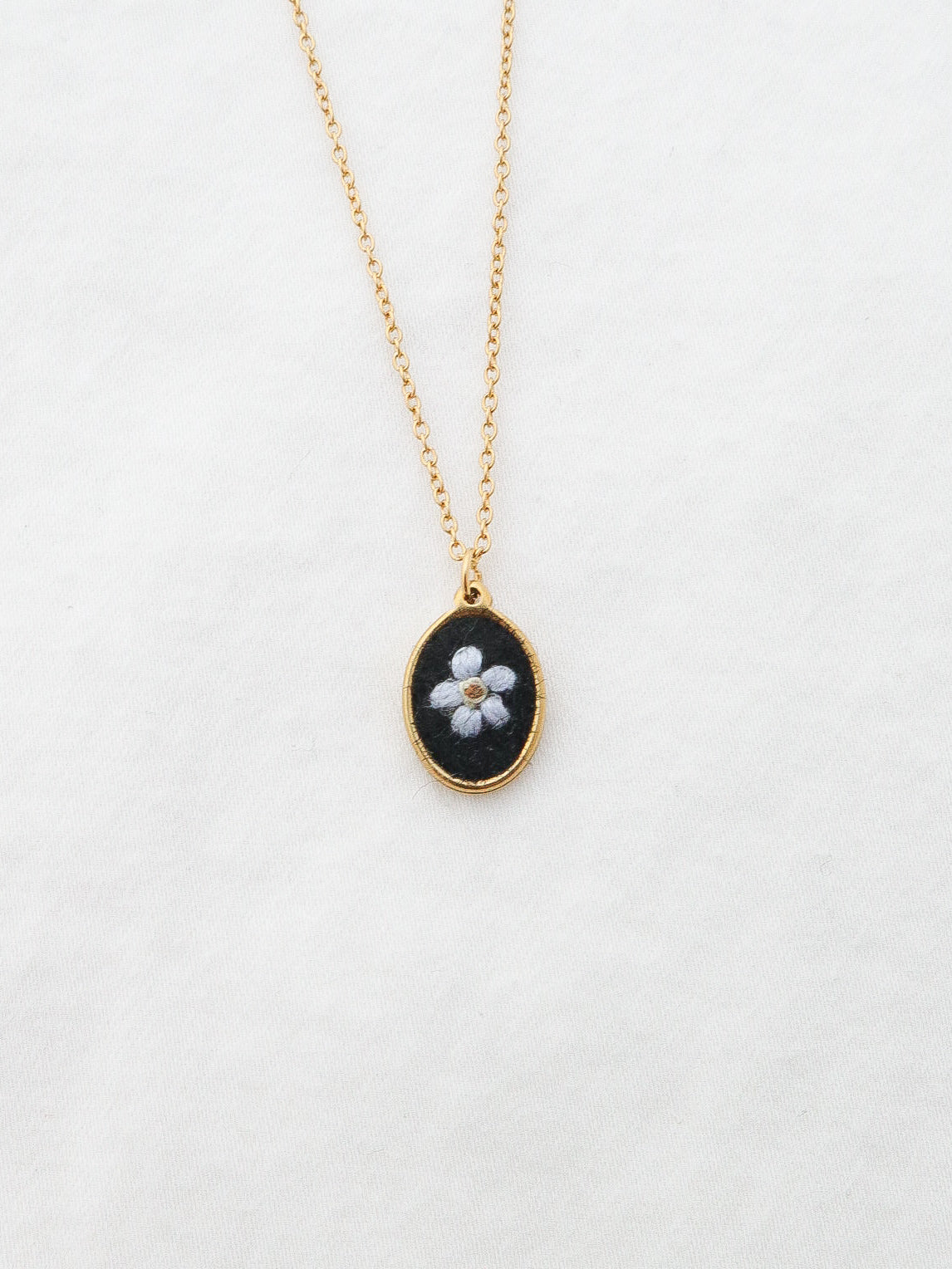 The Dainty Forget Me Not Necklace in Noir