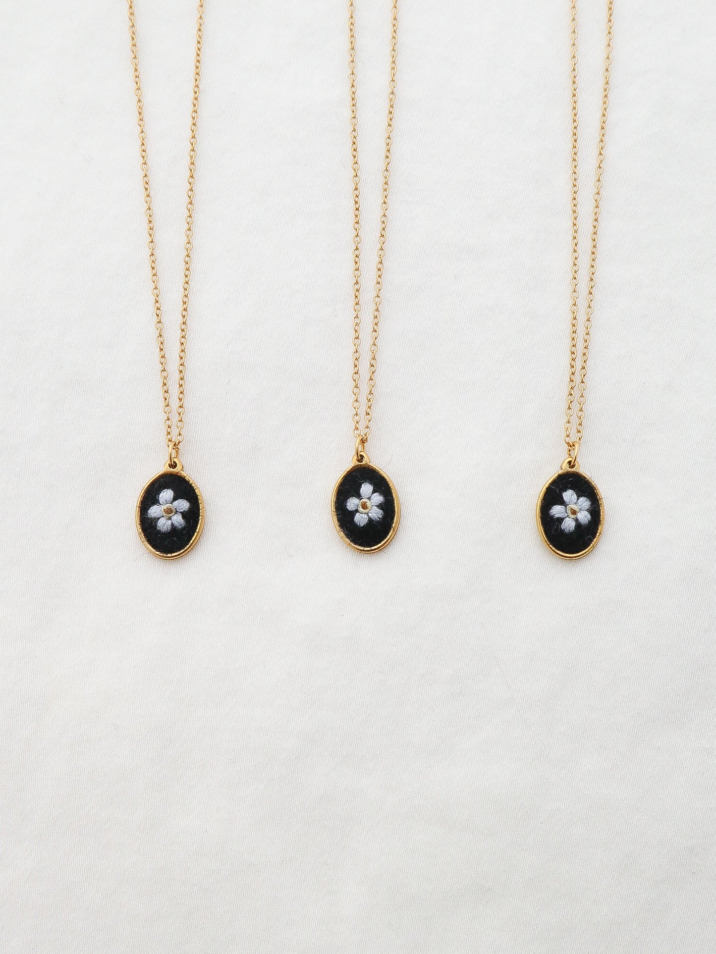 The Dainty Forget Me Not Necklace in Noir