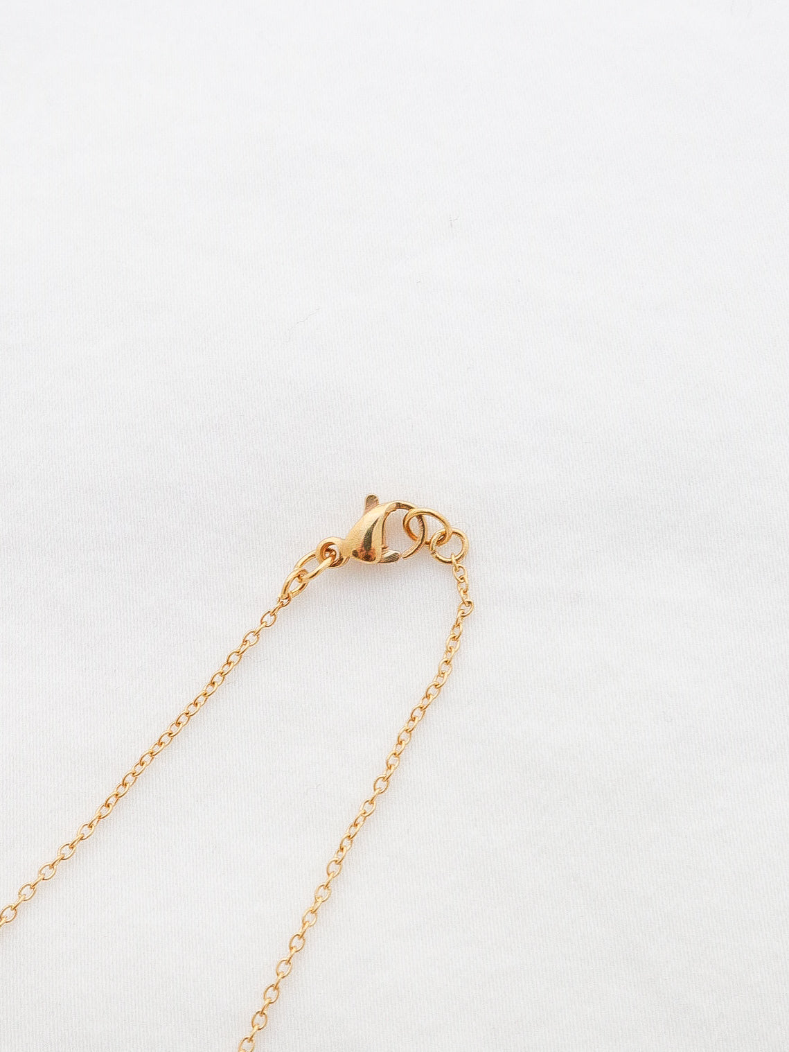 The Dainty Strawberry Necklace in Ivory