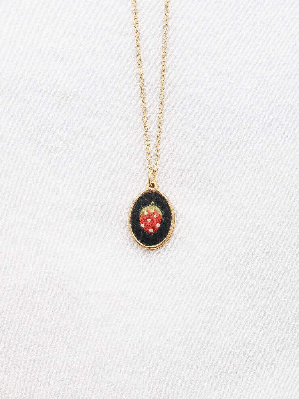 The Dainty Strawberry Necklace in Noir