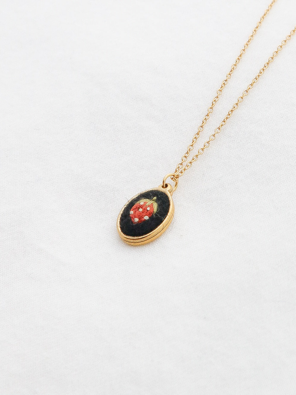 The Dainty Strawberry Necklace in Noir